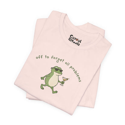 Frog with Martini T-Shirt — “Off to Forget All Problems” Playful Relaxed Tee